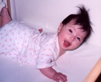 Sandra's Hair Grows Naturally Straight Up, Just like her Father's